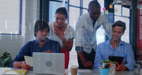 Diverse Team Analyzing Financial Data on Technology Devices in Modern Office - Download Free Stock Images Pikwizard.com