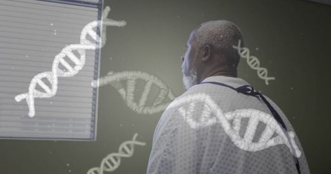 senior man in hospital gown with dna overlay - Download Free Stock Images Pikwizard.com