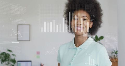 Black woman reviewing digital analytics overlay in modern office, smiling and confident