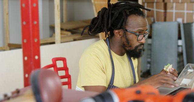 African American Artisan Taking Lunch Break in Workshop - Download Free Stock Images Pikwizard.com