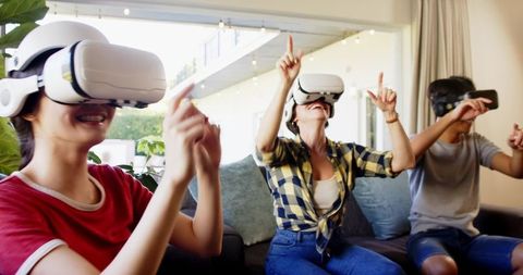 Family Enjoying Virtual Reality Together at Home