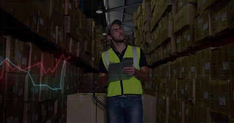 Warehouse Worker Analyzing Inventory with Digital Analytics