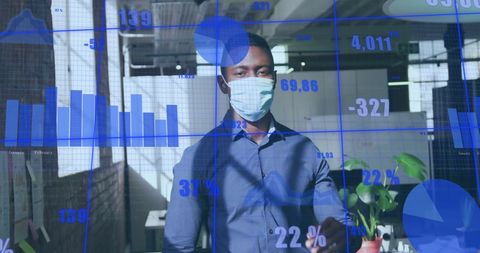 African american businessman analyzing data during covid pandemic