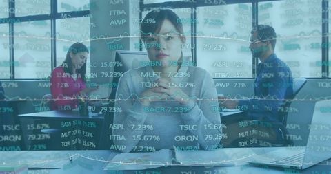 Financial Analyst in Busy Office Analyzing Stock Data