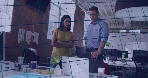 Professionals Collaborating at Modern Office Workspace