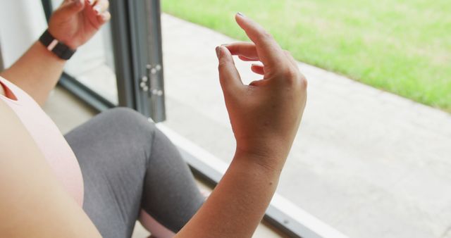 Woman Practicing Meditation Indoors by Large Window - Download Free Stock Images Pikwizard.com