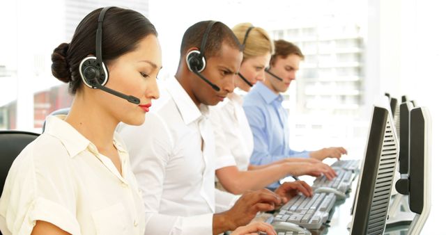 Diverse Customer Support Team Working at Computers in Call Center - Download Free Stock Images Pikwizard.com