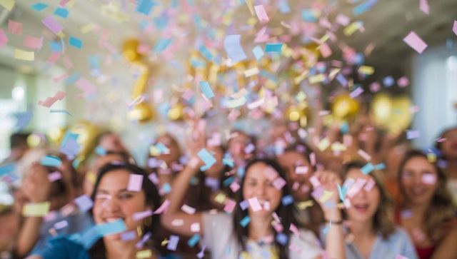 Joyful Celebration with Confetti Falling in Festive Event