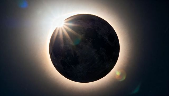 Revealing Diamond Ring Solar Eclipse with Brilliant Corona and Moon Silhouette