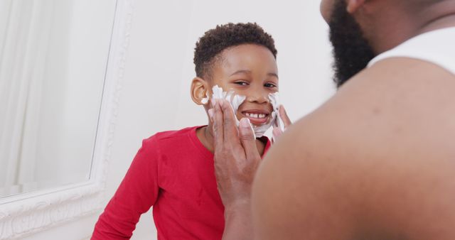 Father Applying Shaving Cream to Happy Son in Bathroom - Download Free Stock Images Pikwizard.com