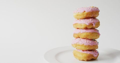 Stack of Pink Iced Donuts with Sprinkles - Download Free Stock Images Pikwizard.com