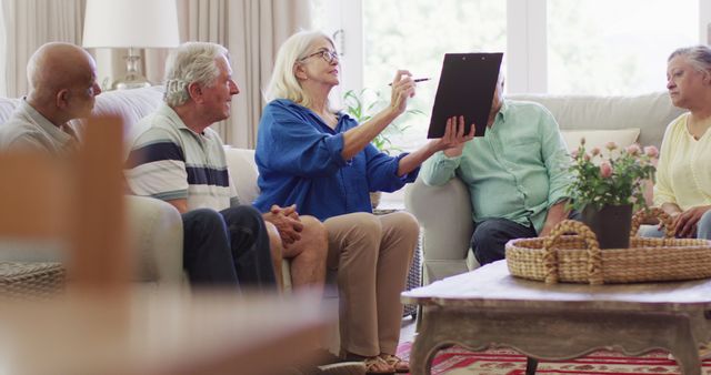 Elderly Group Engaging in Discussion at Senior Center - Download Free Stock Images Pikwizard.com