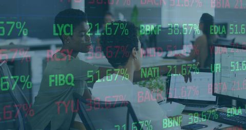 Diverse Coworkers Discussing Stock Market Analysis in Office - Download Free Stock Images Pikwizard.com