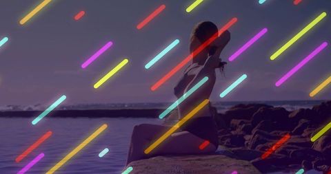 Serene Ocean View with Neon Light Streak Overlays