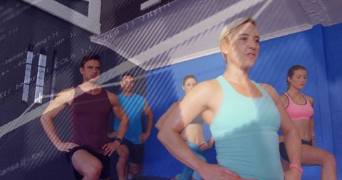 Energetic Group Fitness Class Led by Expert Instructor