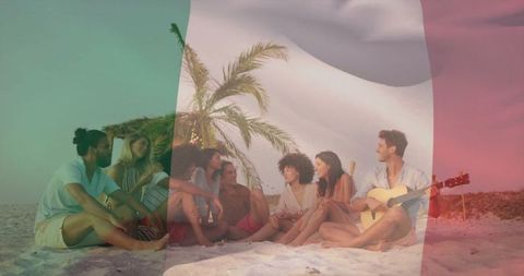 Group Relaxing on Beach with Guitar Under Palm Fronds