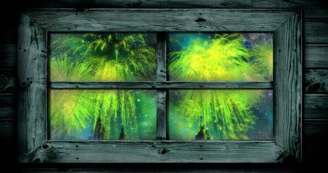 Green Fireworks Display Seen Through Window