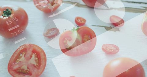 Halved tomatoes featuring translucent data overlays, HUD percentages on white wooden surface