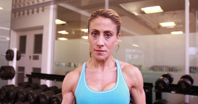 Determined Woman in Gym Ready for Workout - Download Free Stock Images Pikwizard.com