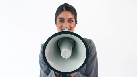 Confident Businesswoman Using Megaphone for Motivation