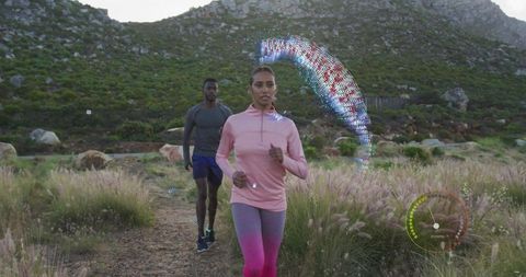 Jogging couple on scenic trail with digital fitness tracking