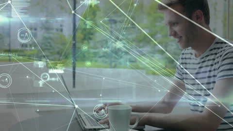 Man Using Laptop with Digital Network Connections Overlay