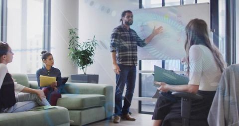 Team presenting strategy in modern office, collaborating around whiteboard and folders