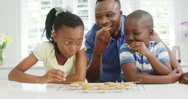 Excited Family Enjoying Freshly Baked Cookies at Home - Download Free Stock Images Pikwizard.com