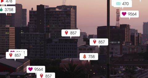 Social Media Icon Overlay on Cityscape at Dusk