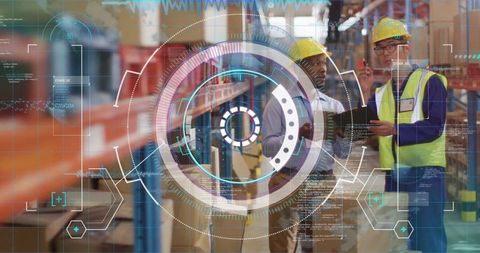 Warehouse team using tablet for inventory management and logistics