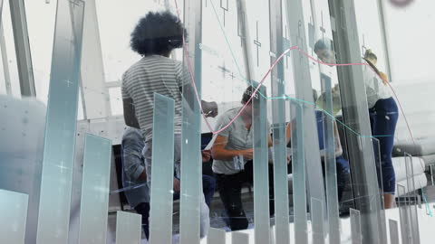 Colleagues Collaborating with Overlaid Data Visuals