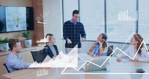 Professional team discussing business strategies in modern conference room