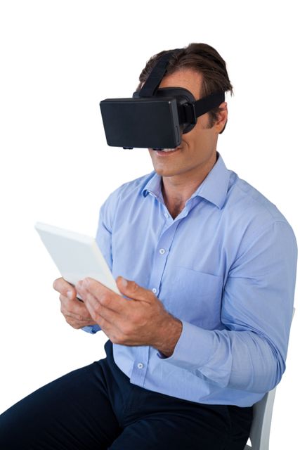 High angle view of businessman with tablet using vr glasses against white background