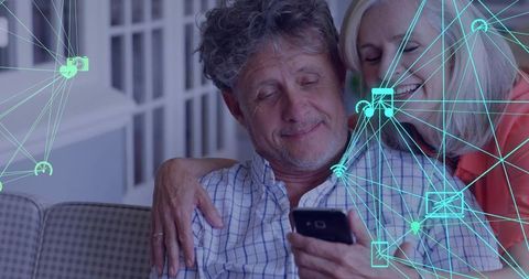 Smiling Senior Couple Using Smartphone with Tech Network Overlay