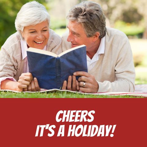 Happy senior couple enjoying leisure reading outdoors