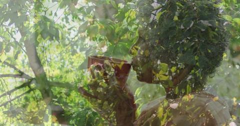 Elderly woman embracing nature with morning tea in leafy surroundings
