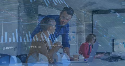 Coworkers and Graph Overlays in High-Tech Business Environment - Download Free Stock Images Pikwizard.com