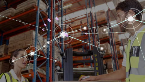 Warehouse Workers Analyzing Digital Network in Logistics Hub