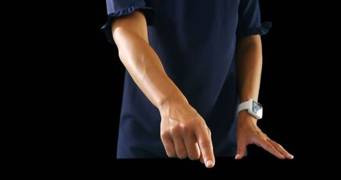 Businesswoman pointing gesture in office environment