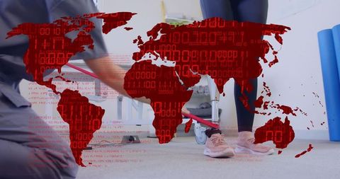 Physiotherapy session with patient using red resistance band for exercise