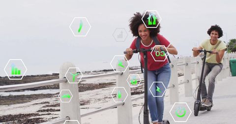 Couple Enjoying Electric Scooter Ride by the Coast with Eco-Friendly Data Icons - Download Free Stock Images Pikwizard.com