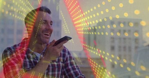 Man on rooftop using smartphone with digital overlay