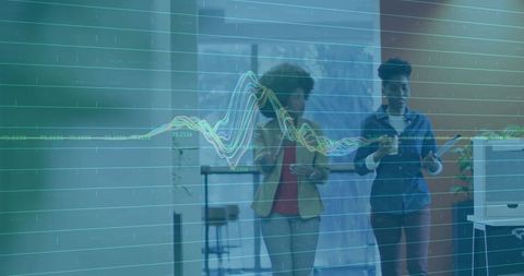 Walking colleagues discussing data analytics on tablet with holographic hud overlay