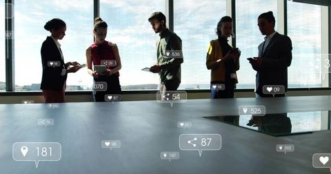 Business team networking with mobile devices, ar engagement icons, collaborating in boardroom