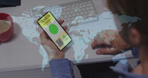 Man checking covid-19 vaccination passport on smartphone