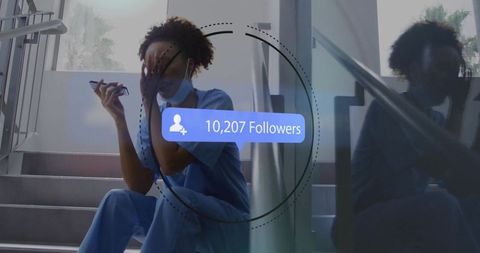 Exhausted clinician sitting on stairs checking smartphone with 10,207 followers