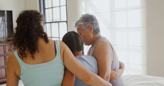 Multigenerational Family Embracing in Warm, Sunlit Home - Download Free Stock Images Pikwizard.com