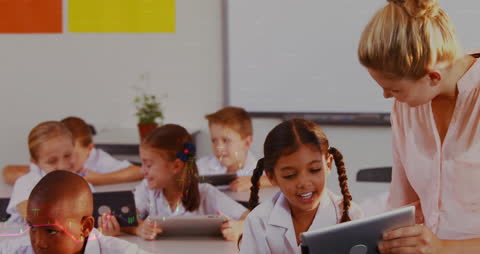 Diverse Schoolchildren Using Digital Tablets in Classroom
