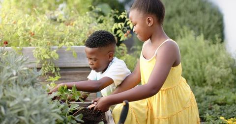Kids Gardening Together in Vibrant Garden Environment