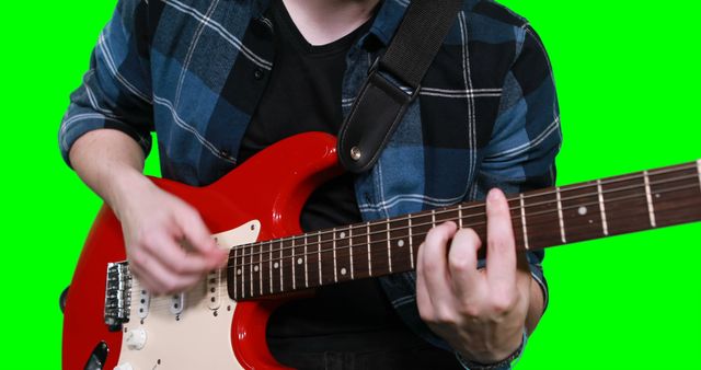 Young Musician Playing Electric Guitar on Green Screen Background - Download Free Stock Images Pikwizard.com